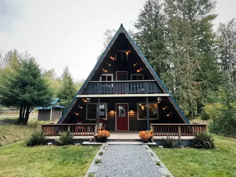 Large Ranger's A-frame cabin rental with decks and balcony in forest setting near Mt Rainier, Ashford, Washington