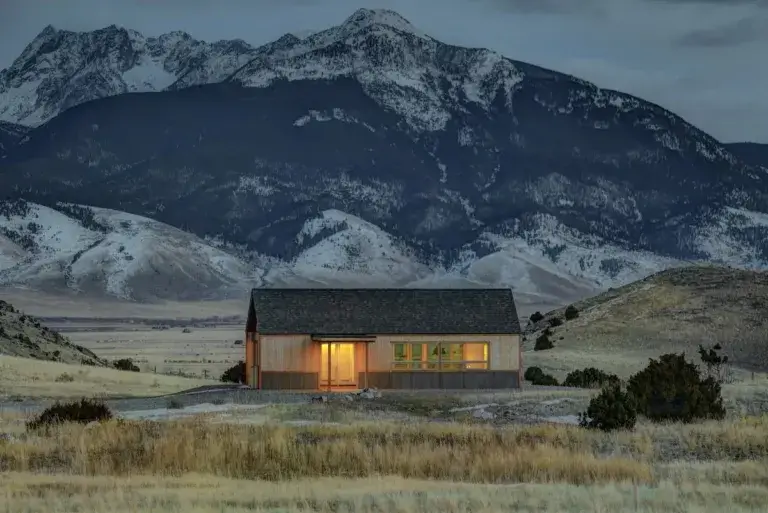 Modern Sophia's House rental at Erik's Ranch set against dramatic snow-capped mountains in Livingston, Montana