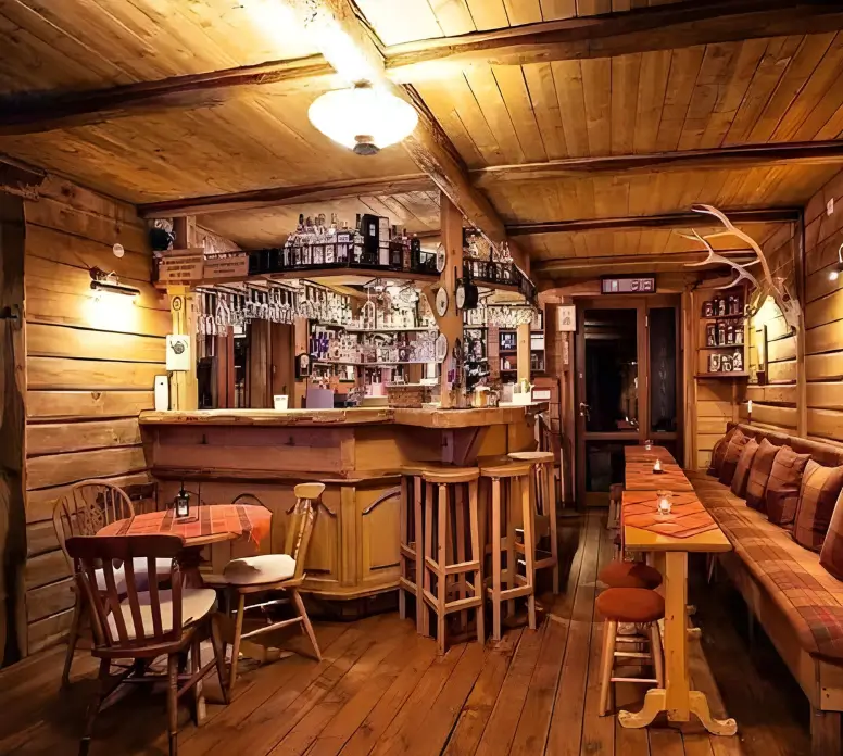 The Timbered Taproom - Inspiring Bar Log Cabin Ideas 
