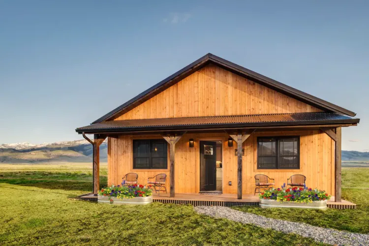 Lone Cactus Cottage rental in Paradise Valley, Montana, a charming wood-sided cabin with mountain views, near Yellowstone.