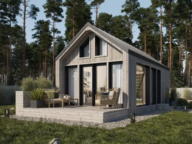 The Nordic modern cabin by Ilumhouse with a gabled roof and loft windows, a spacious prefab home for under 50k.