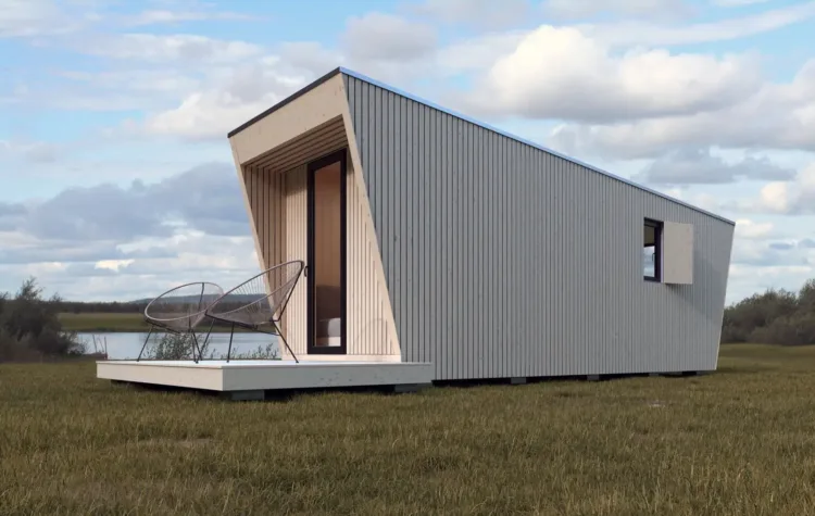 The sculptural DROP Box N-240 modular home with light wood siding, an architectural prefab home for under 50k.