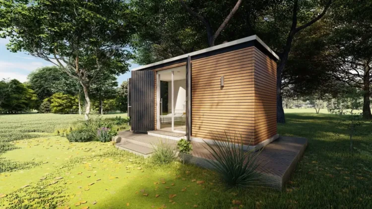 The Applause B guest house, a wood-clad modern prefab studio, an affordable modular home under 50k in a garden.