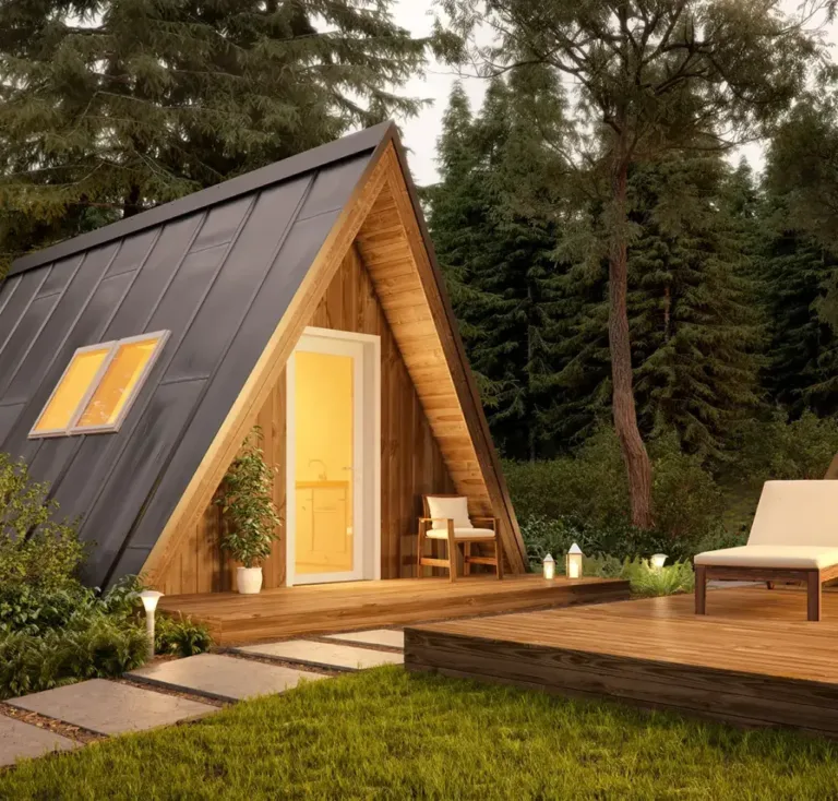 The Avrame Solo, a charming small A-frame structure with a wooden deck, a budget-friendly prefab kit under 50k