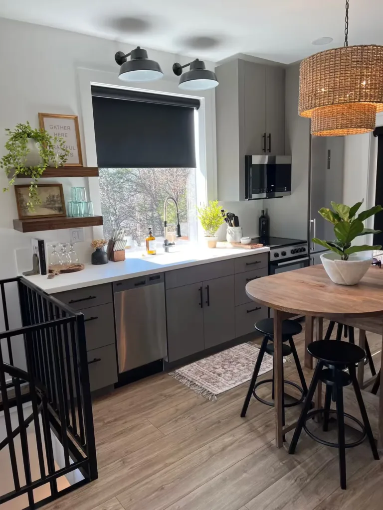 The kitchen is a stylish and functional space that feels both modern and welcoming. 