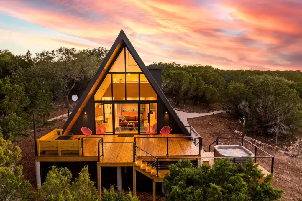 8. Modern A-frame Tucked in Nature1 of 76 A-frame House Exteriors Ideas to Inspire You