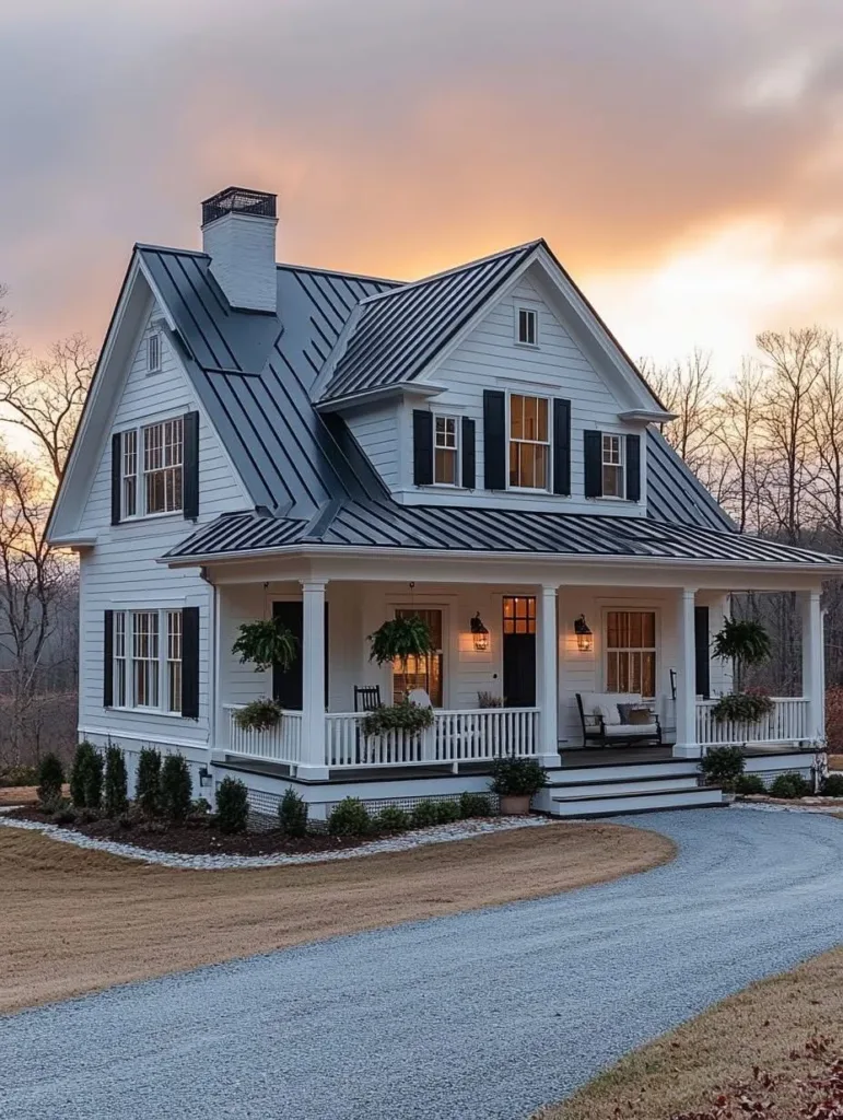 White farmhouse with a front porch, black shutters, and a gravel driveway