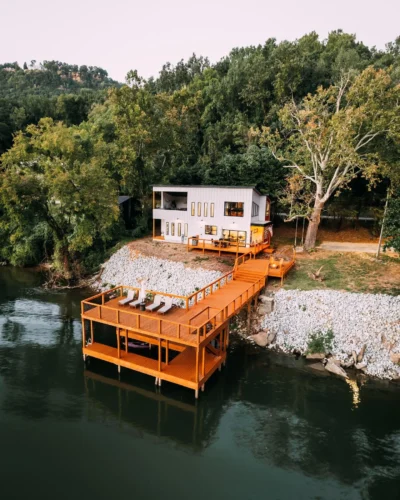 Dreamy modern cabin with a private dock and expansive deck.