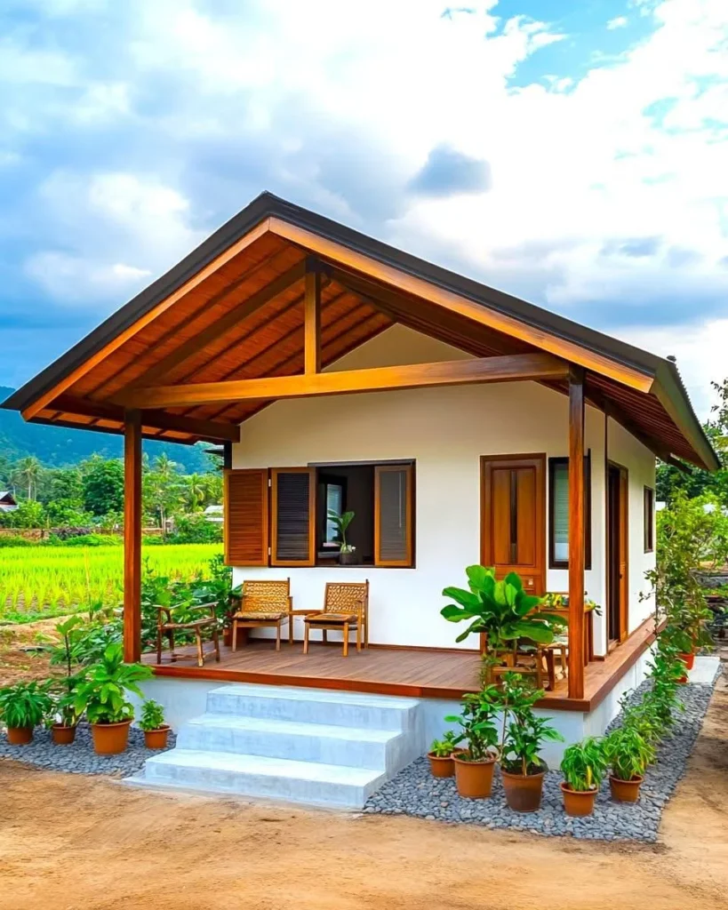 Traditional tropical wooden cottage with a cozy porch and wooden shutters.