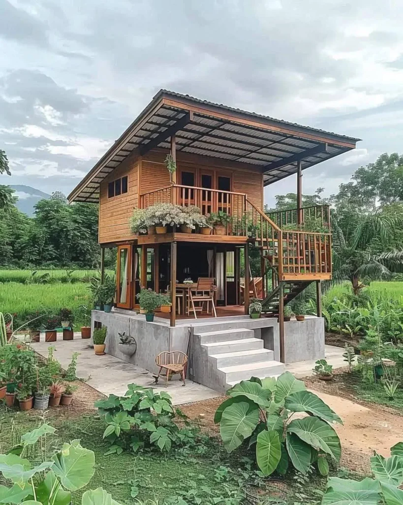 Two-story tropical wooden house with an open lower level and rustic charm. tropical wooden house